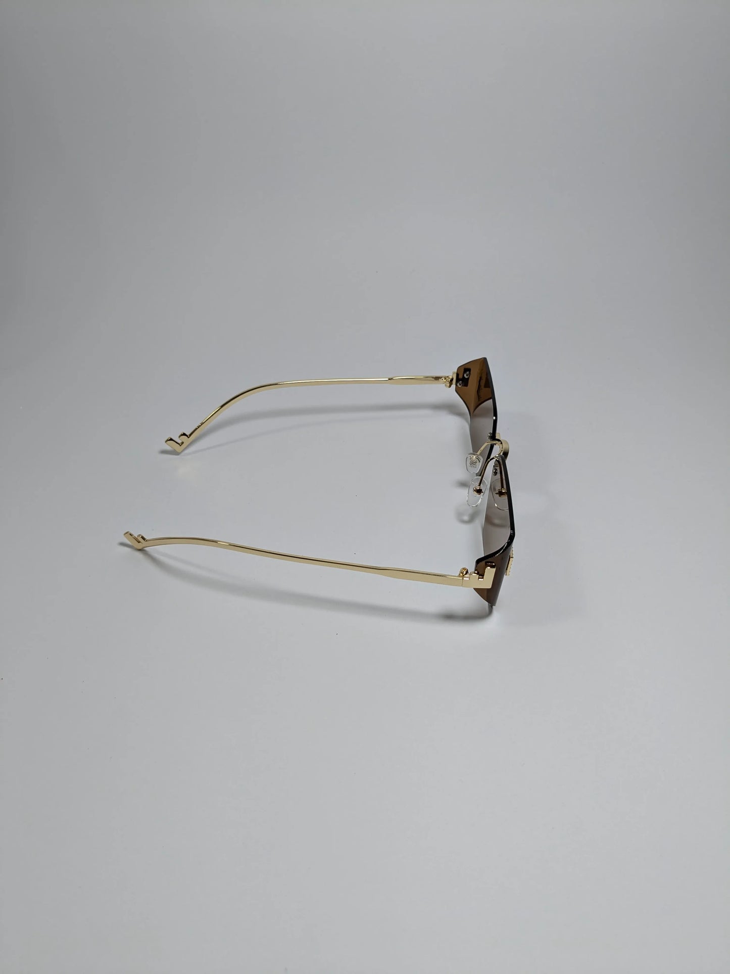 Fen dii - mdoo1 (2) Rectangle Rimless Sleek Golden Metal Frame Sunglasses