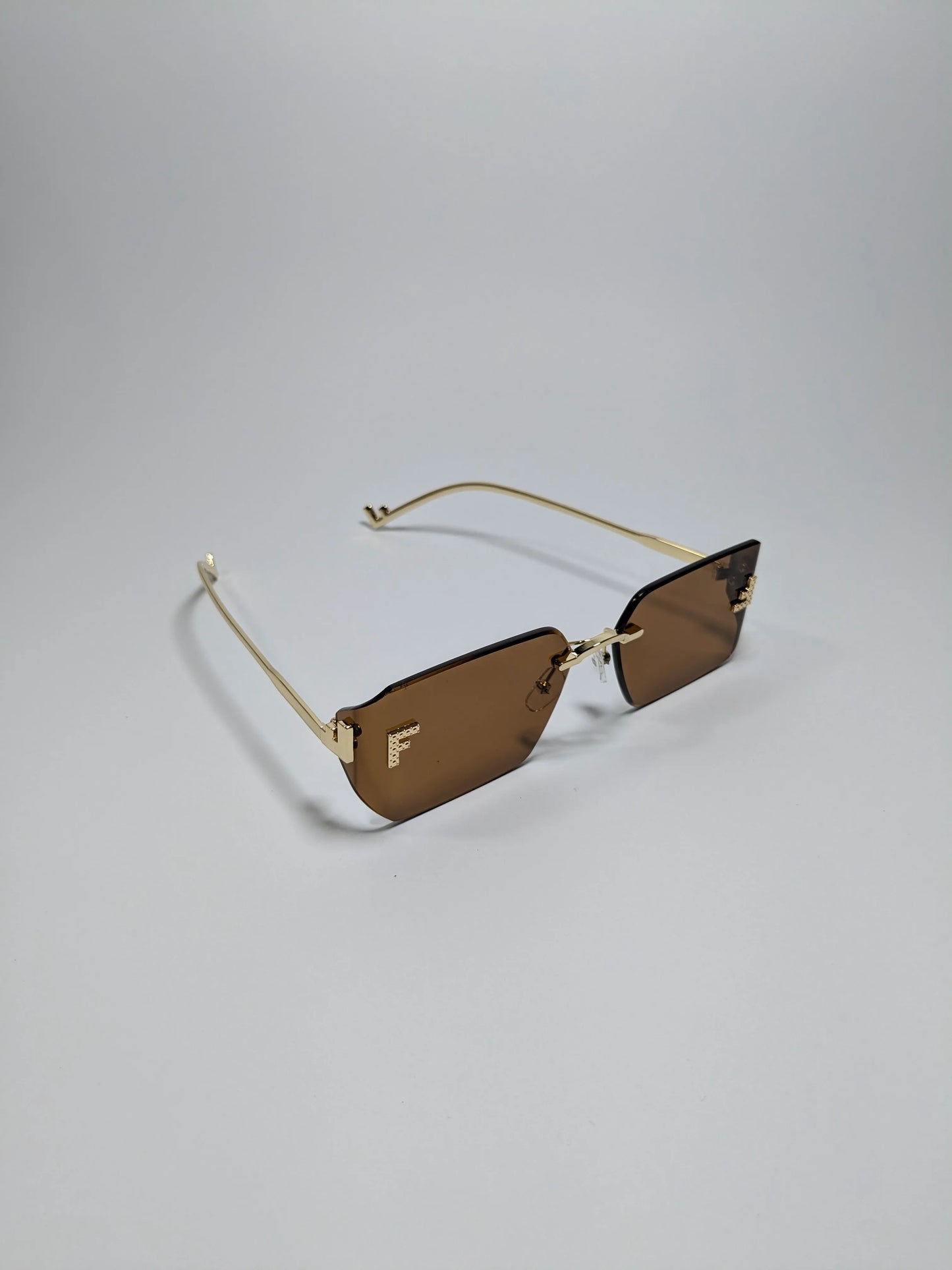 Fen dii - mdoo1 (1) Rectangle Rimless Sleek Golden Metal Frame Sunglasses