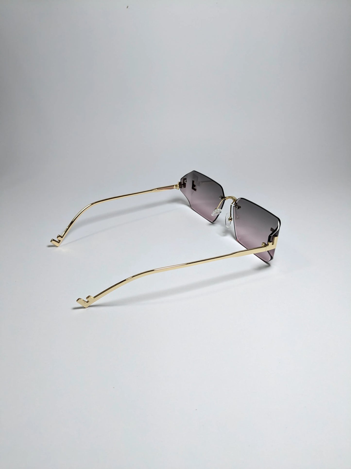 Fen dii - mdoo1 (1) Rectangle Rimless Sleek Golden Metal Frame Sunglasses